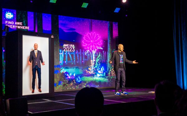 Ori Inbar on the main stage with his holographic digital twin